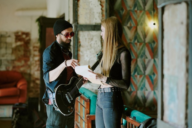 male female musicians working new song